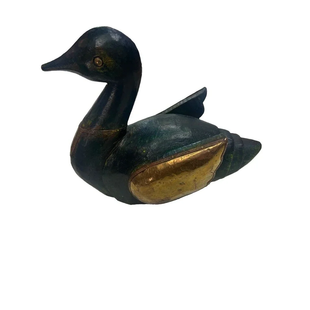 Unique wood and metal carved duck